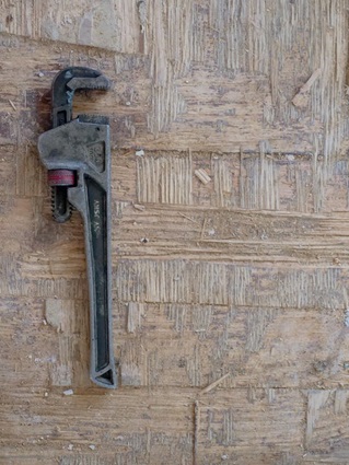 An adjustable range tool used for plumbing