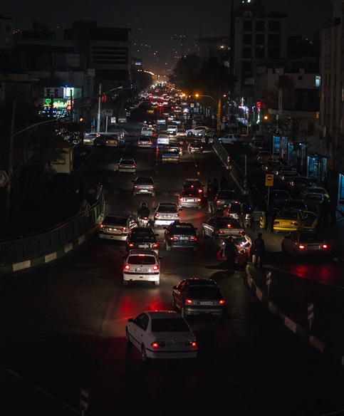 Traffic on roads in a city at night