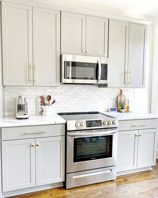 An Image Of Kitchen Cabinets And Stove Top